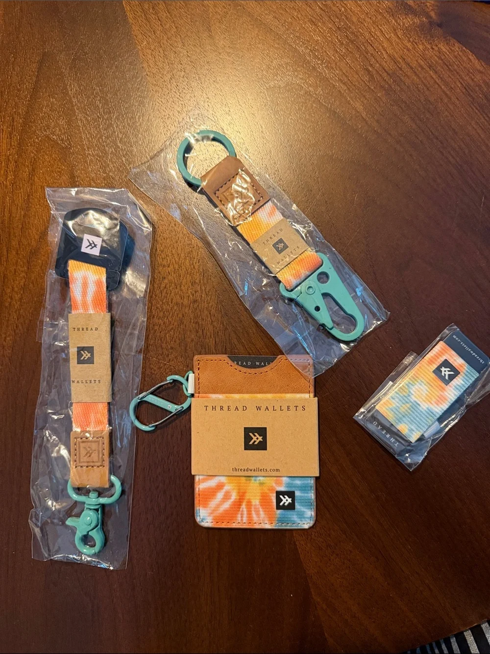 Kavu Tie-Dye Orange Blue Thread Wallet Card Holder with Teal Hardware